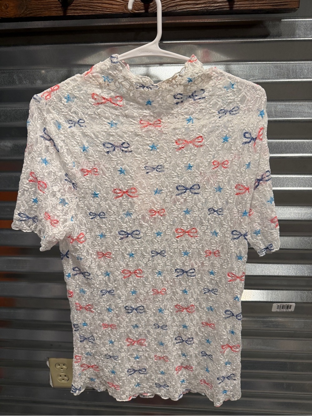 Sheer bow woman’s top size large